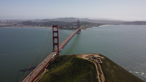 Aerial view of the Golden Gate Bridge and the San Francisco hills.
